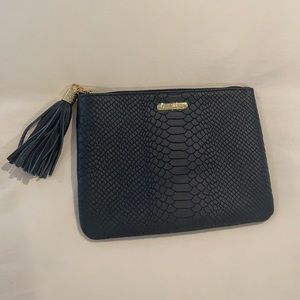 NWT Gigi New York navy blue clutch.
